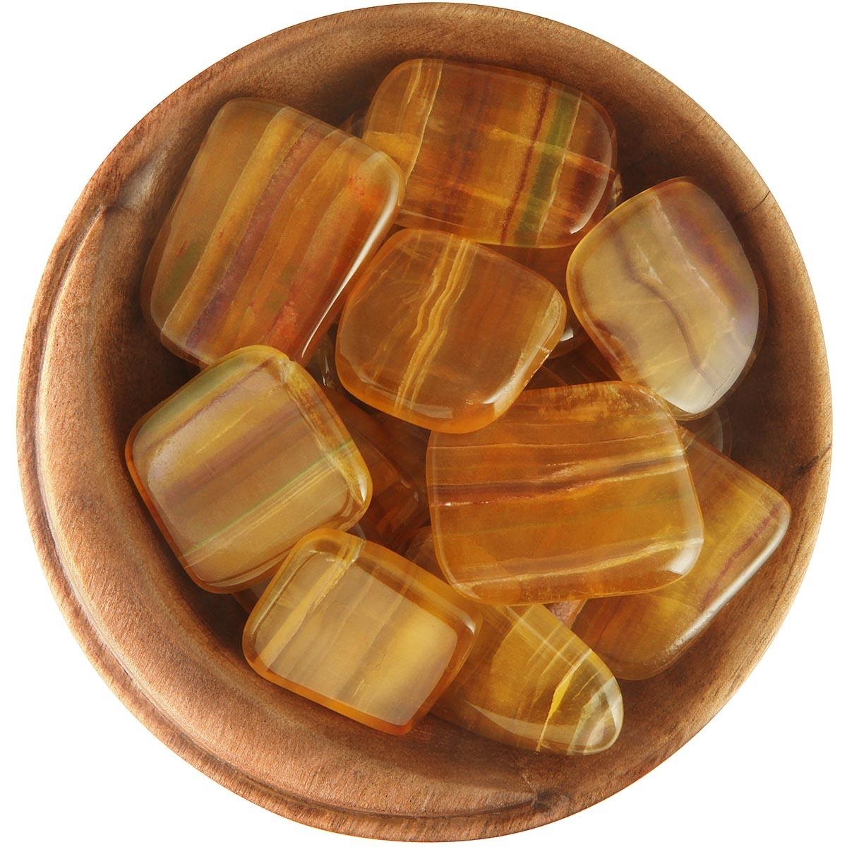 Bowl of yellow fluorite stones