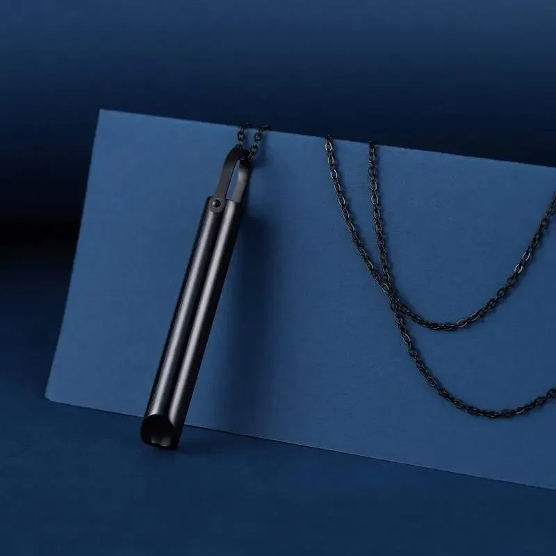 Black breathing necklace pendant on a chain